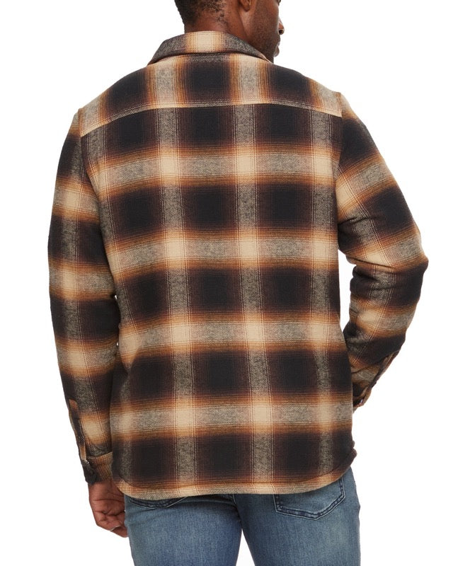 model wearing Harmon Sherpa Lined Shirt Jacket in Brown/tan/black Plaid rear view