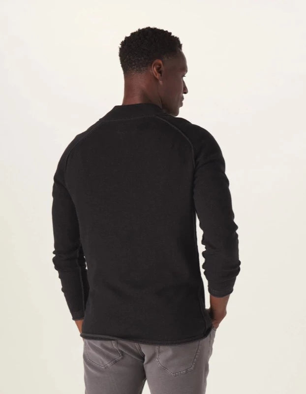 Model Wearing Jimmy Quarter Zip sweater in black rear view