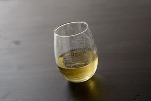 Well Tod brand stemless wine glass with omaha map etched in it
