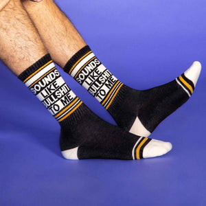 Model Wearing Gumball Poodle Gym Socks with "Sounds Like Bullshit To Me" woven in them