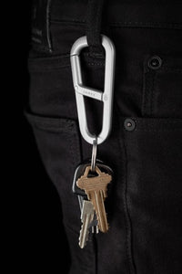 The James Brand Hardin Key/Carabiner clip  shown holding keys on a belt