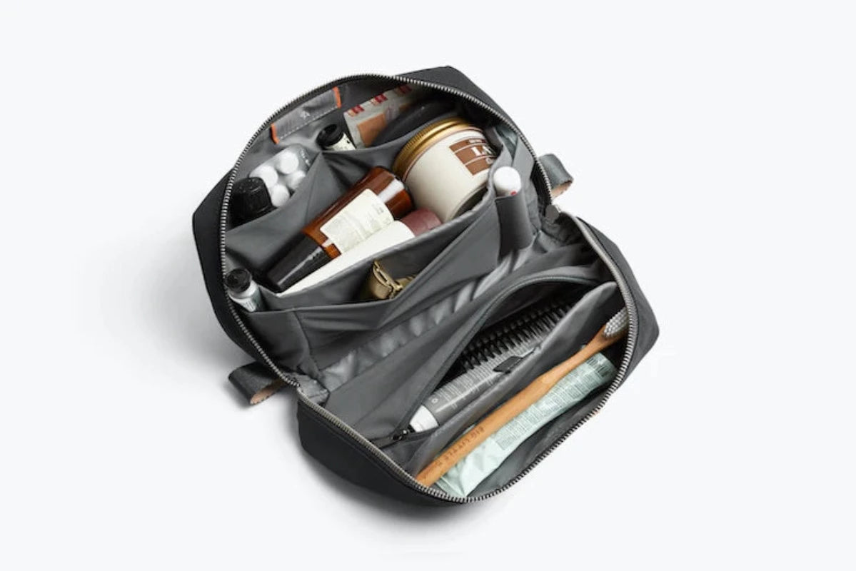 Bellroy Toiletry kit Plus In Charcoal open with example contents