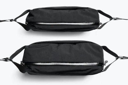 Bellroy Venture Sling Camera Edition in Midnight open showing side by side comparison of slim and expanded capacity