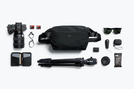 Bellroy Venture Sling Camera Edition in Midnight open showing contents that could fit in the bag