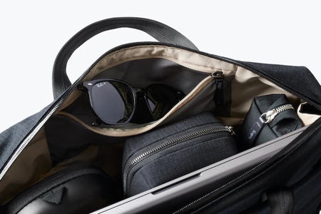 Bellroy Via Work Bag in Black looking down inside the open bag with sunglasses holder open