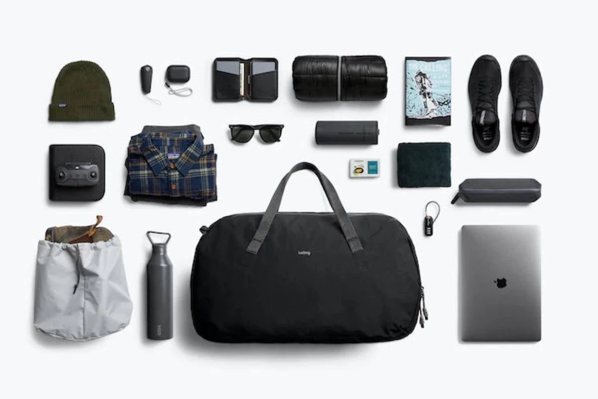 Bellroy Venture Duffel 40L in Midnight expanded view showing contents that will fit in the bag